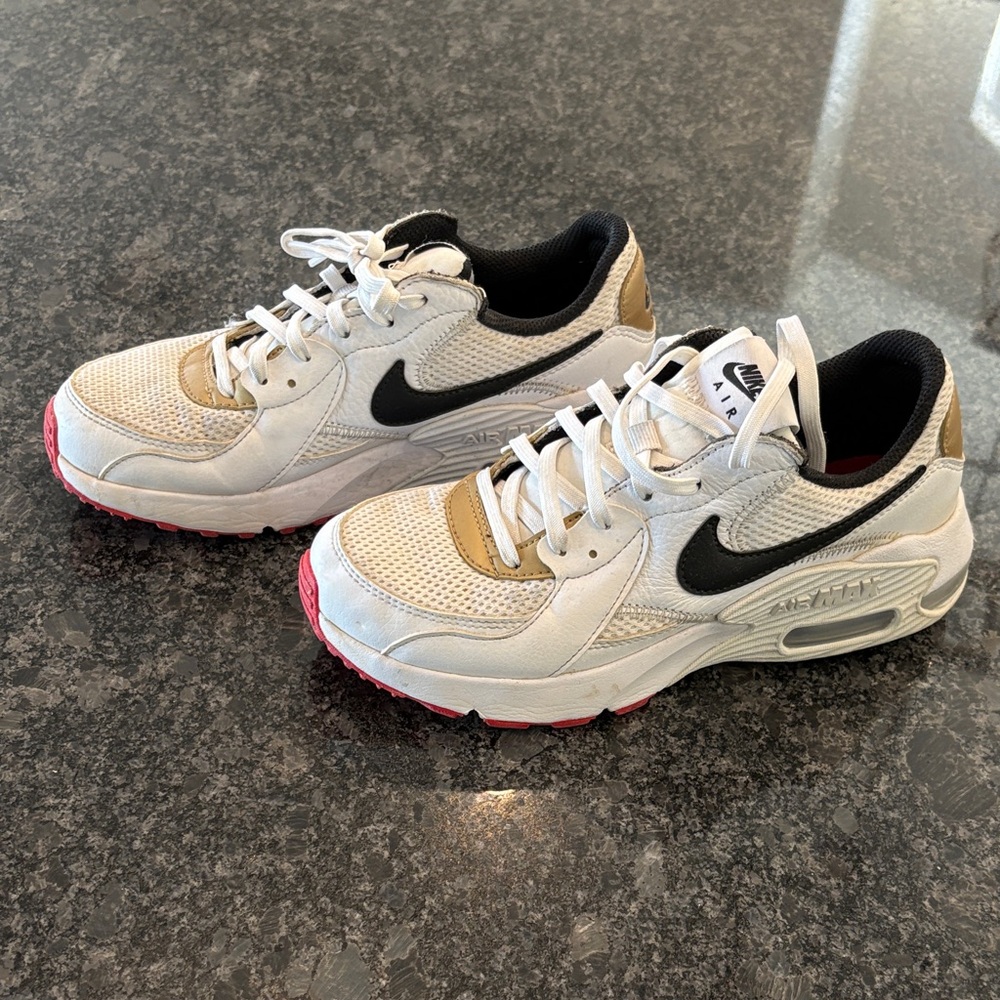 Nike White and Black Air Max Sneakers with Red Soles